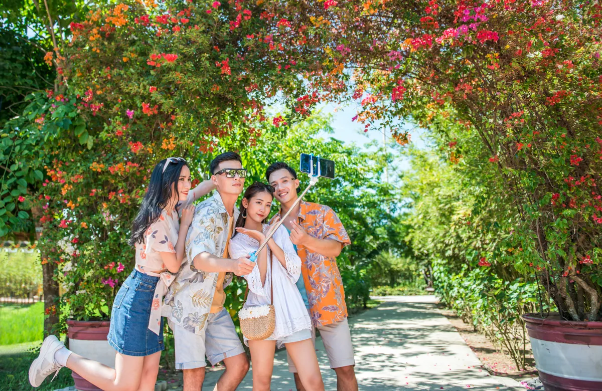 Family walking and exploring VinWonders Nam Hoi An theme park
