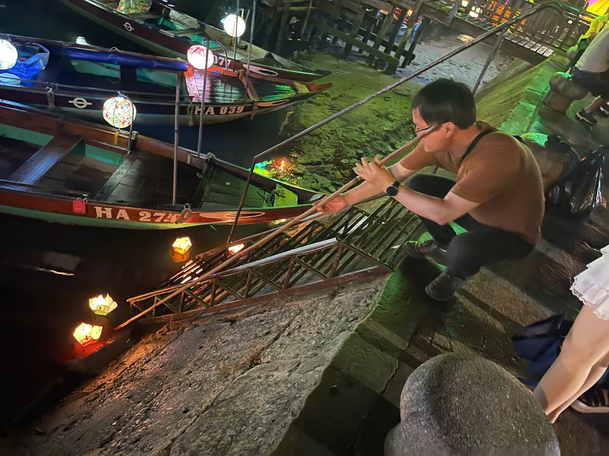 Floating lanterns on Hoai River Hoi An at night