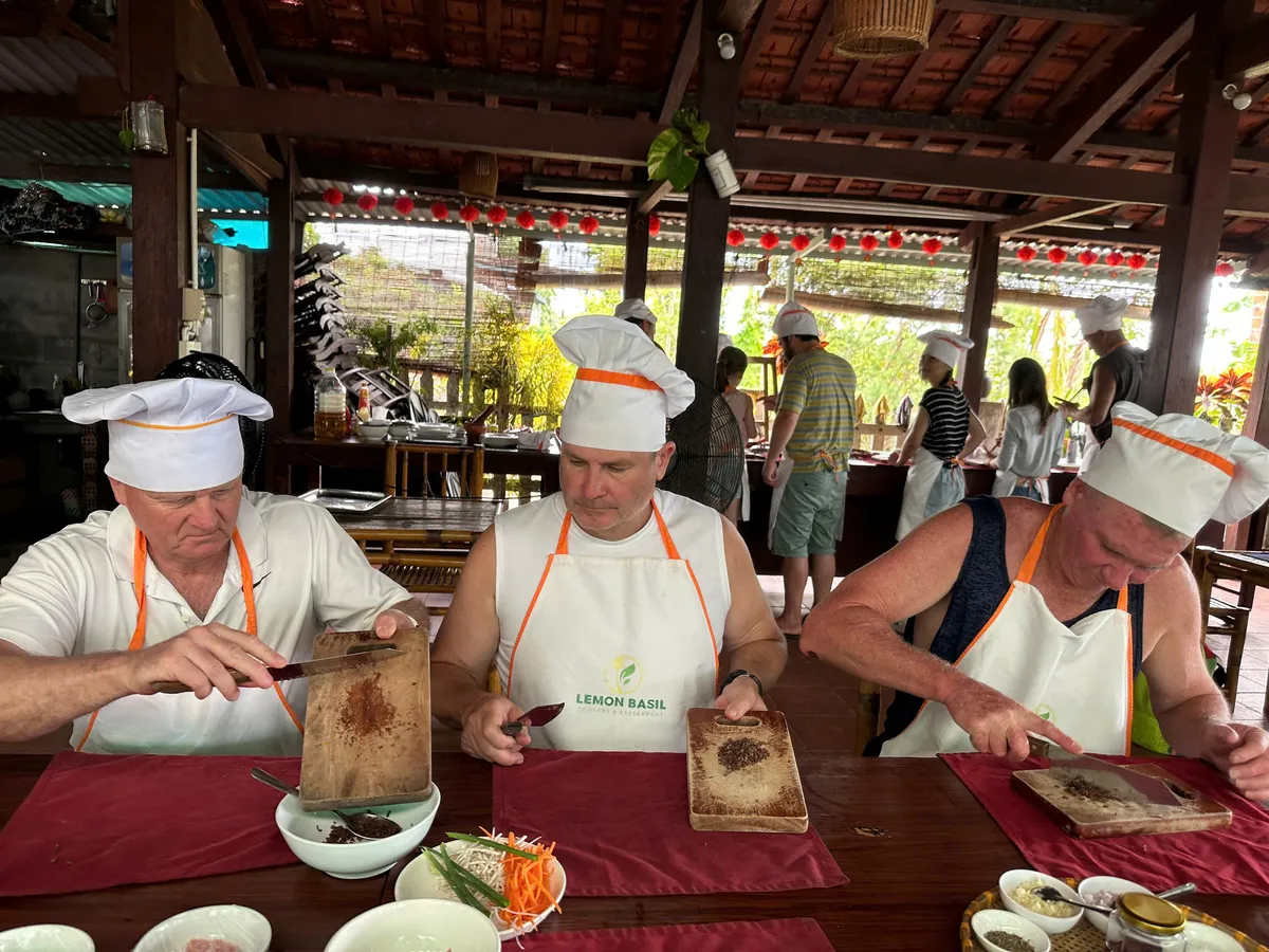 Making fresh rice paper and spring rolls in Hoi An cooking class