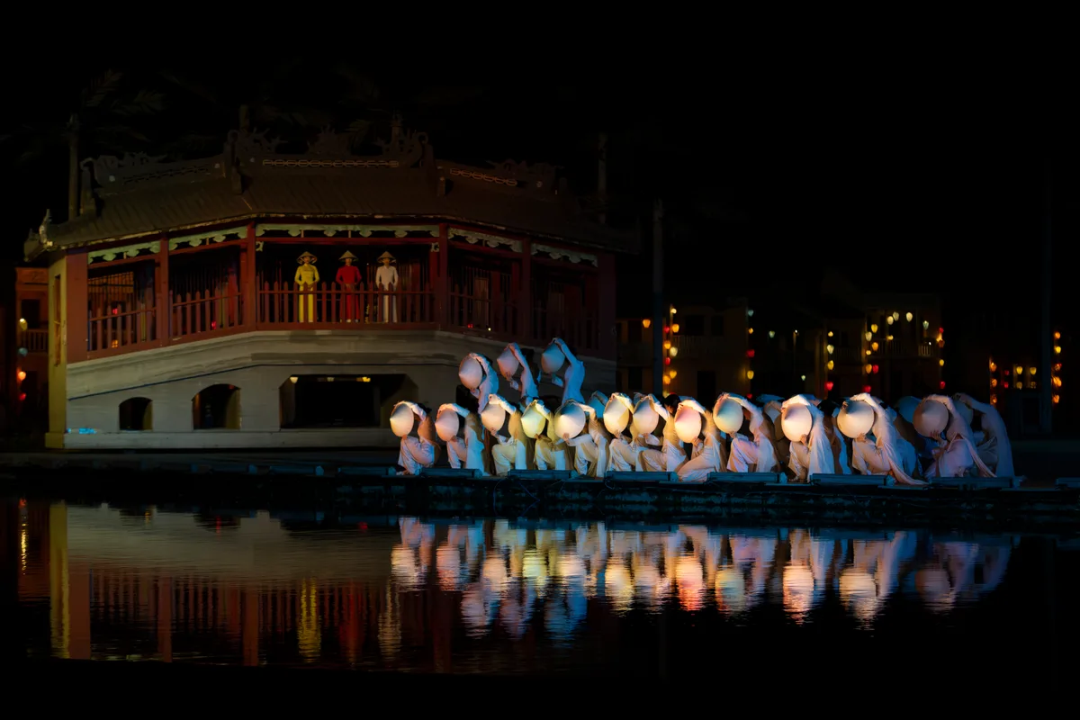 hoi an memories show act 5 ao dai 100 vietnamese women cycling through ancient town